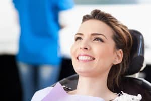 General dentistry Lee Family Dentistry provides excellent dental treatments for all your oral health needs so you never have to go through the frustration of braces or invasive dental treatments again. Contact Lee Family Dentistry for general dentistry treatments. Image of smiling woman patient getting a dental prodedure.